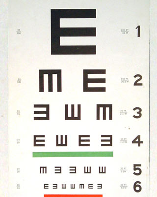 A "Tumbling E" eye chart from the 1950s. The chart has capital E's facing in different directions, so people being tested can indicate which direction the letter is pointing, instead of having to read different letters.