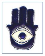 A blue metal pendant in the shape of a human hand with five fingers. In the center of the pendant, there is a white and blue representation of a human eye. 
